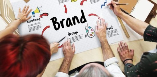 team working on brand value proposition