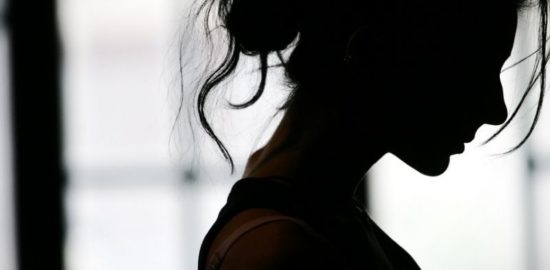 silhouette of sad woman