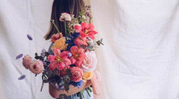 woman holding flowers