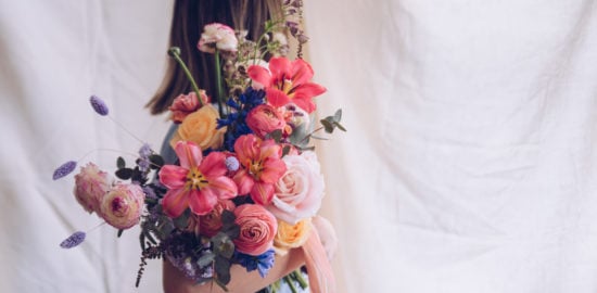 woman holding flowers