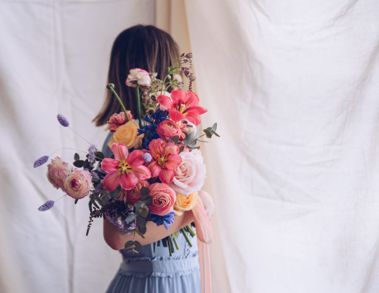 woman holding flowers