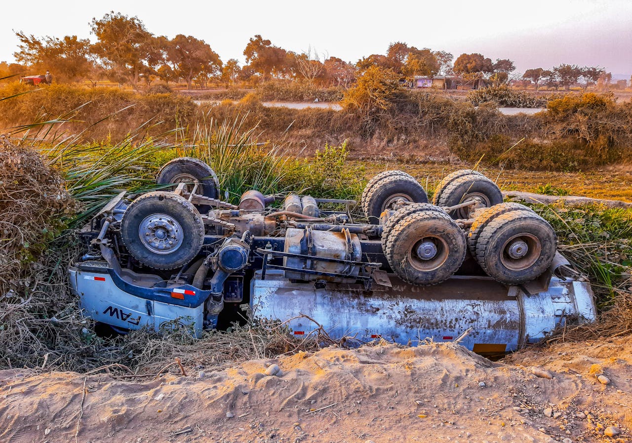 Photo by Edgar Toro: https://www.pexels.com/photo/wrecked-truck-upside-down-on-roadside-5293081/