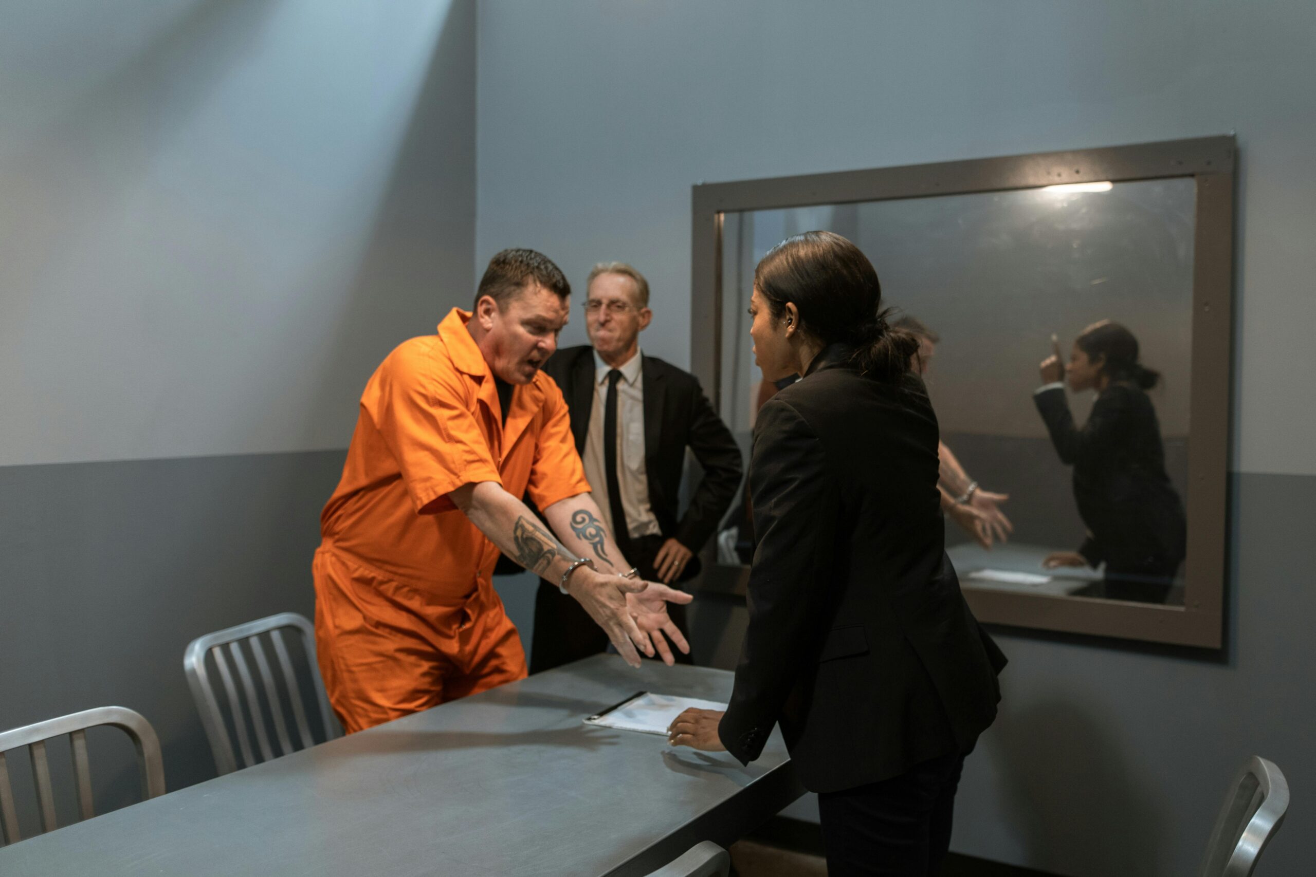 Photo by RDNE Stock project: https://www.pexels.com/photo/man-in-black-suit-standing-beside-woman-in-orange-coat-6069509/