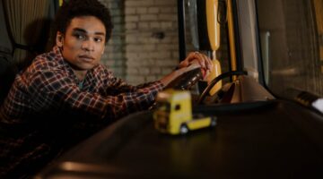 Photo by cottonbro studio: https://www.pexels.com/photo/a-man-sitting-in-a-truck-7541982/