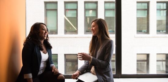 Photo by Christina Morillo: https://www.pexels.com/photo/woman-in-gray-formal-coat-sitting-near-black-full-glass-panel-window-1181562/