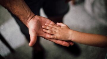 Photo by Juan Pablo Serrano : https://www.pexels.com/photo/father-and-child-s-hands-together-1250452/