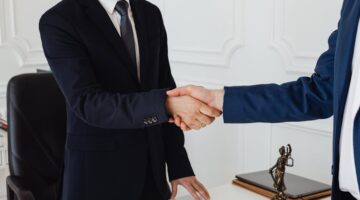 Photo by Photo By: Kaboompics.com: https://www.pexels.com/photo/hand-shake-of-two-men-7875996/