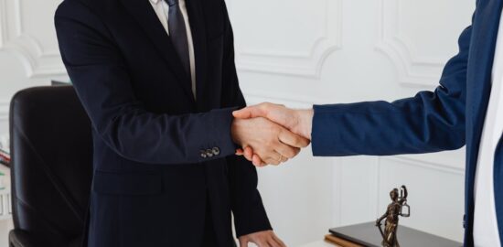 Photo by Photo By: Kaboompics.com: https://www.pexels.com/photo/hand-shake-of-two-men-7875996/