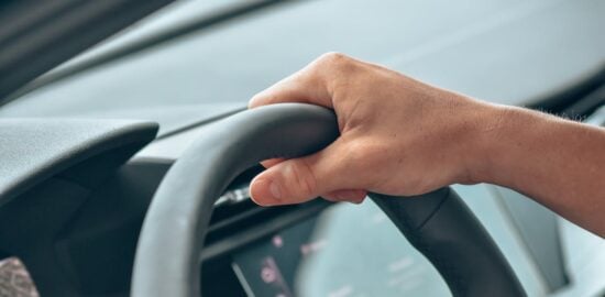 Photo by Leon Kohle: https://www.pexels.com/photo/a-close-up-shot-of-a-person-driving-a-car-13165489/