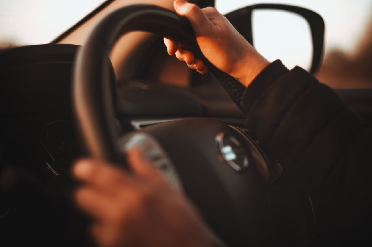 Photo by Nathan J Hilton: https://www.pexels.com/photo/close-up-photo-of-a-steering-wheel-15289805/