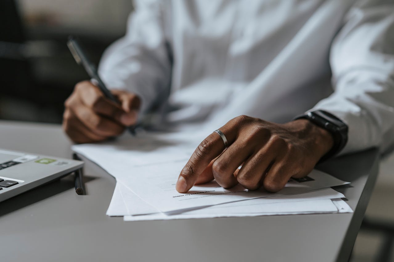 Photo by olia danilevich: https://www.pexels.com/photo/documents-on-the-table-5313170/
