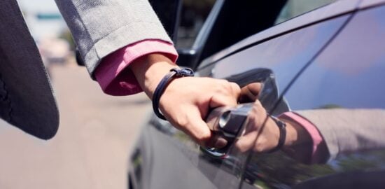 Photo by Alan Quirván: https://www.pexels.com/photo/a-person-s-hand-opening-a-car-door-14541142/