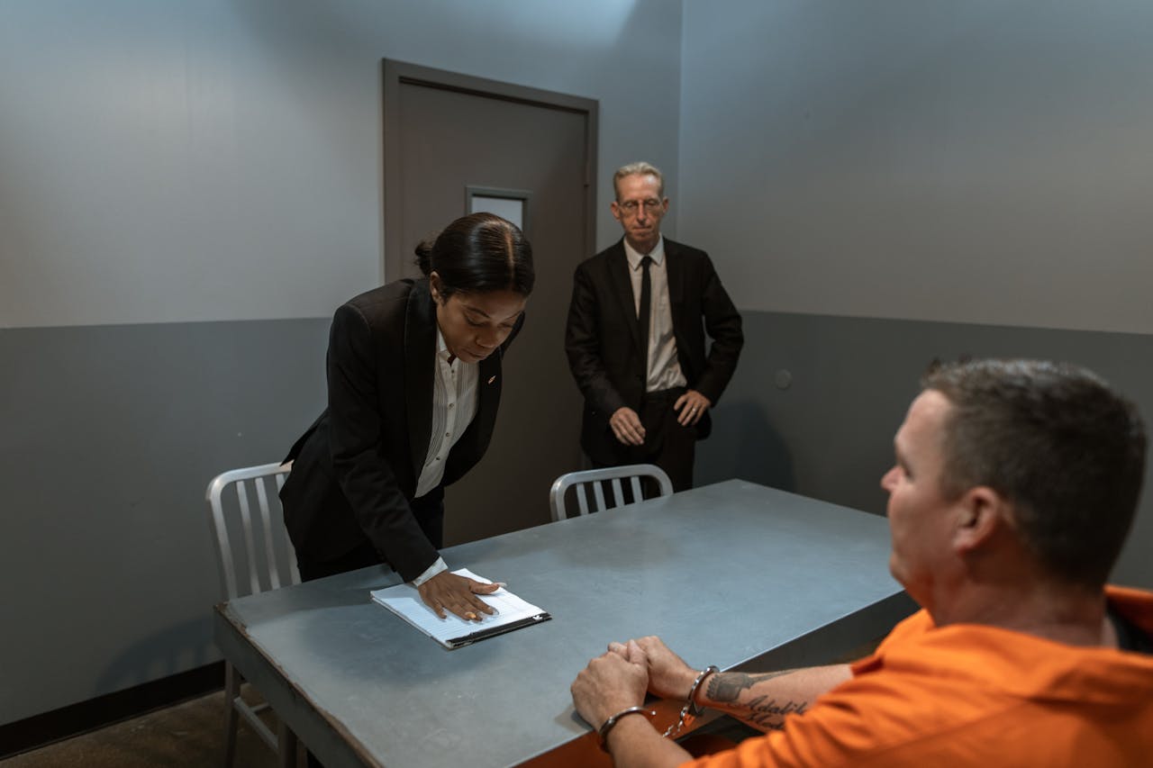 Photo by RDNE Stock project: https://www.pexels.com/photo/man-in-black-suit-jacket-standing-beside-man-in-orange-jacket-6065138/