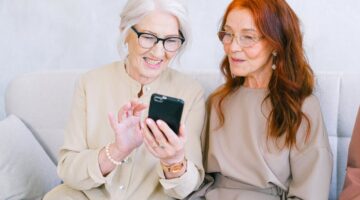 Photo by Anna Shvets: https://www.pexels.com/photo/cheerful-senior-women-shopping-online-on-smartphone-5257306/