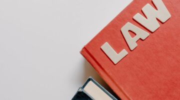 Photo by Tara Winstead: https://www.pexels.com/photo/close-up-of-books-with-a-word-law-on-the-top-8850747/