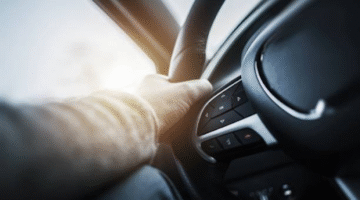 https://www.istockphoto.com/photo/driving-car-steering-wheel-gm869551228-145078649