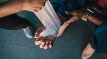 Photo by RDNE Stock project: https://www.pexels.com/photo/person-putting-bandage-on-another-person-s-hand-6519904/